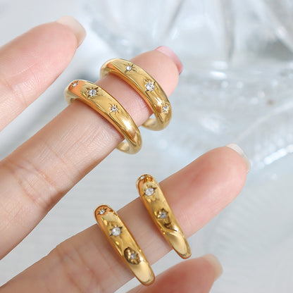 A luxurious 18K gold fashion ring with diamonds