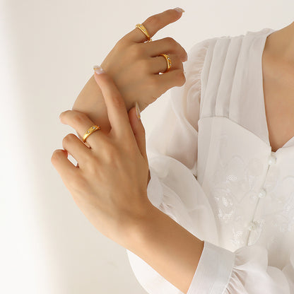 A luxurious 18K gold fashion ring with diamonds