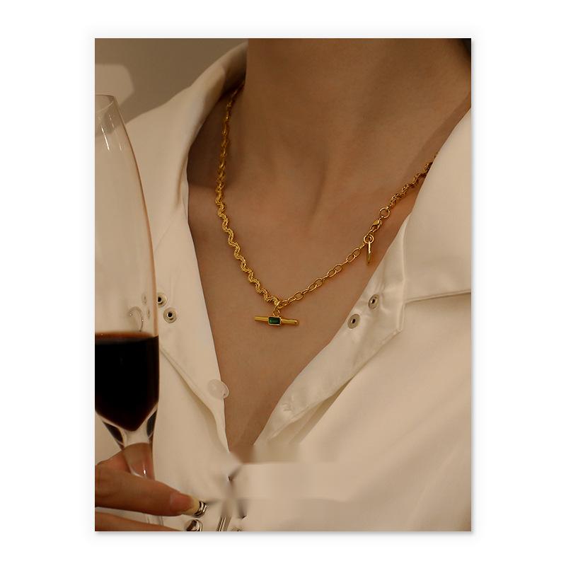 14k gold curved chain gemstone necklace