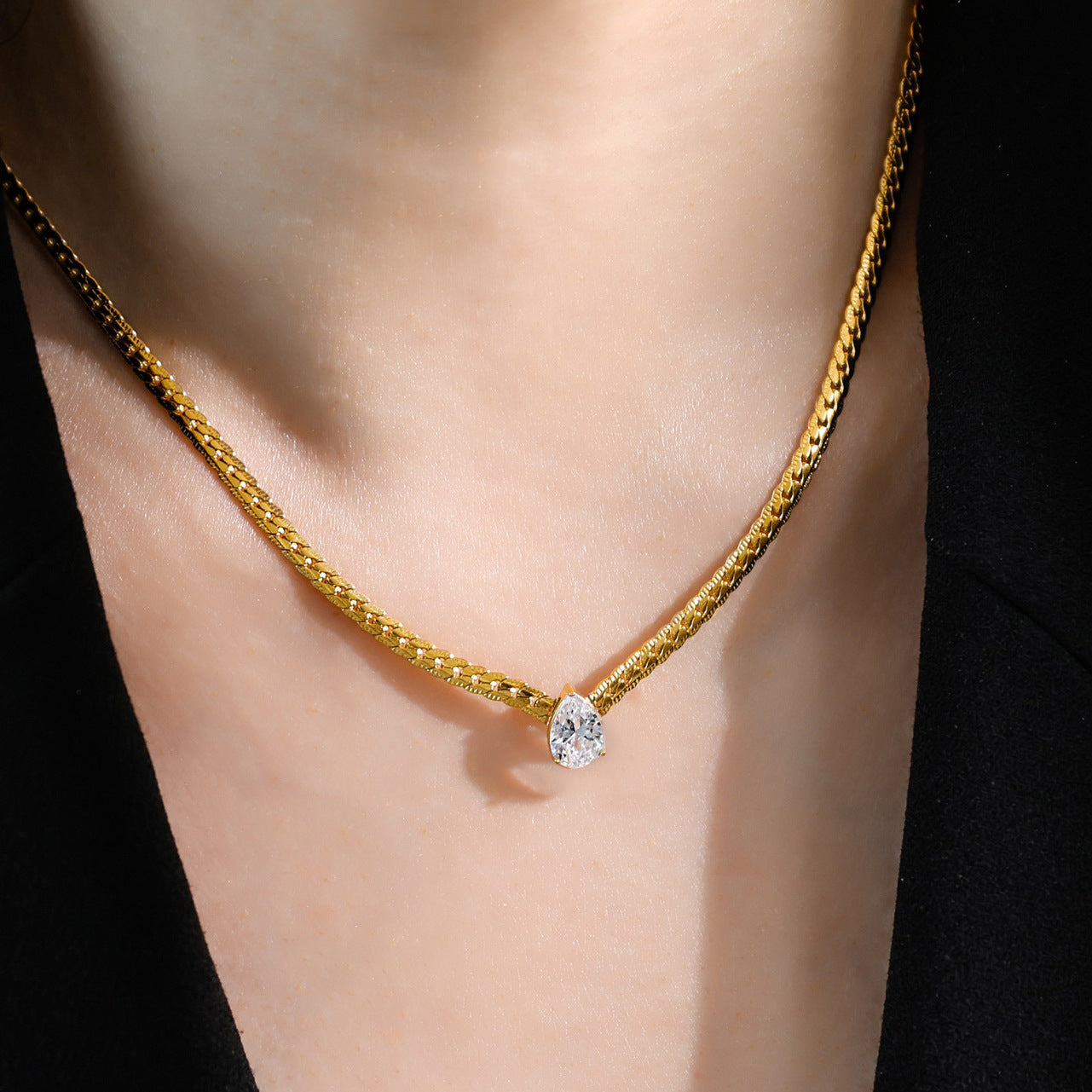 14K Gold Snake Bone Chain Necklace with Heart-Shaped Diamond